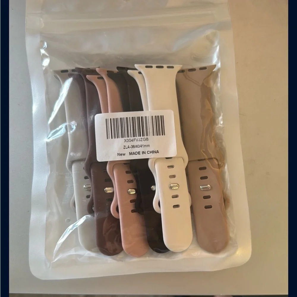 Apple Watch Bands in Black, Brown, and Cream